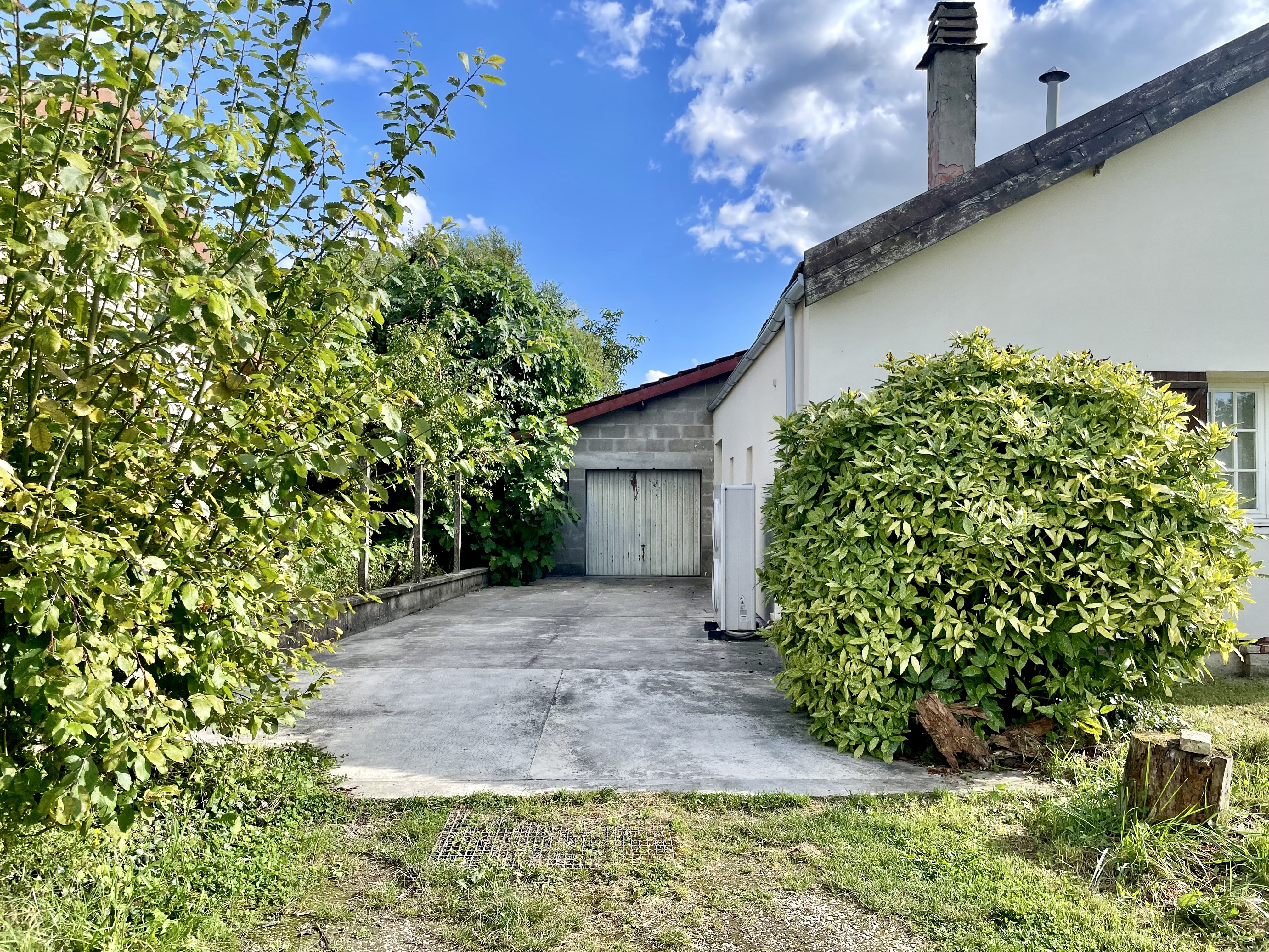 Garage vue gauche — Maison à vendre Charmont Marne